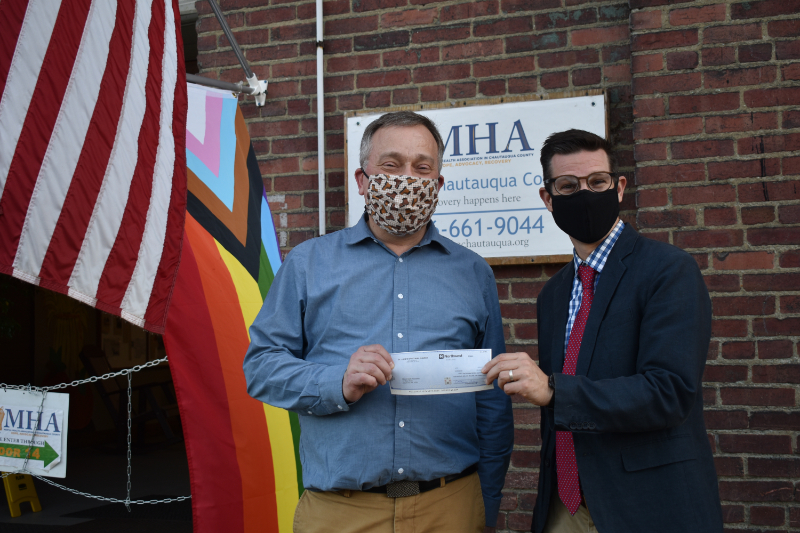  The Mental Health Association in Chautauqua County (MHA) was fortunate to be among several organizations and the Jamestown Public Schools to receive generous donations from St. Luke’s Thrift Shop. Fr. Luke Fodor, rector of St. Luke’s Episcopal Church in Jamestown (pictured on the right) stopped by the MHA to present a check in person to MHA Executive Director Steven Cobb.