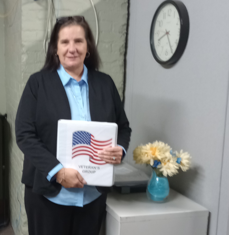 As a United States Air Force veteran herself, Finance Director Jill Marsh facilitates a group for veterans and their families at the Mental Health Association in Chautauqua County. With the approaching cold weather, she is also encouraging donations to the Hat and Glove Drive. 