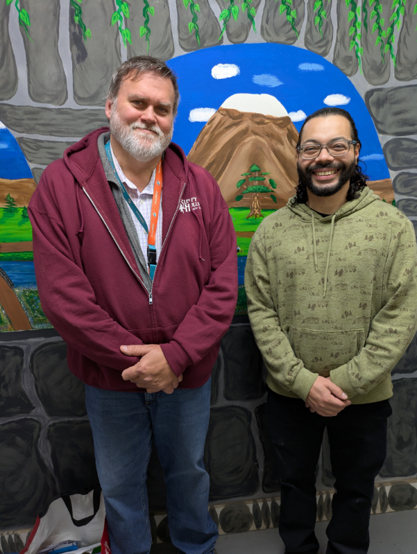 Executive Director Michael Nordin, left, introduced Victor Flores at the Mental Health Association in Chautauqua County’s November recovery luncheon. Flores is Code Blue Manager for the Recovery Options Made Easy (ROME) warming center at 917 Washington Street in Jamestown. 